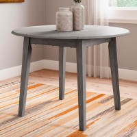 Shullden Round Dining Room Drop Leaf Table